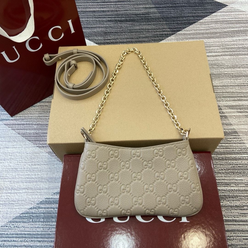 G*u*i top handle bags